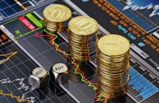 Курс евро на торгах Московской биржи приблизился к 62 рублям